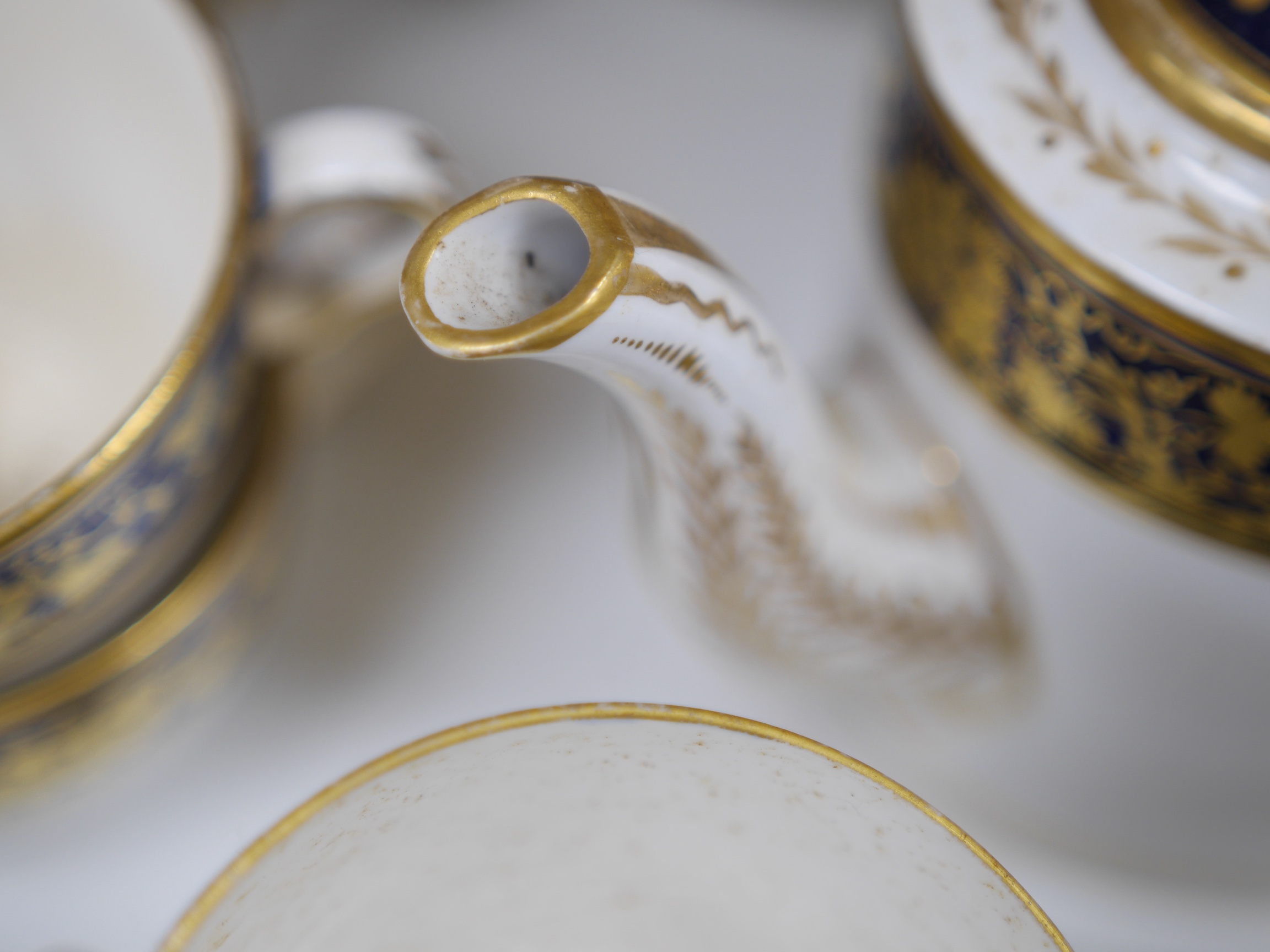 A 19th century Spode gilt decorated tea and coffee service, tea pot 16cm high. Condition - many items poor